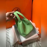Фотография picotin lock 18 см с золотой застежкой. Продуктовая корзина — лучший 