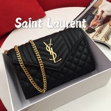 Очень практичная сумка от YSL. Ремешок можно снять, и она станет сумочкой. Имеет