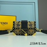 В комплекте с жестким футляром Fendi by Versace из черной кожи.