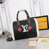 Сумка speedy 30 bandoulière из коллекции 56966 украшена вставками из шерсти.