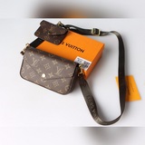 Сумка Félicie Strap & Go M80091 выполнена в классическом стиле Monogram.