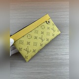 m44323 discovery pochette Маленькая сумка Эта небольшая сумка в стиле диско.