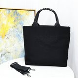 Джинсы PRADA с эффектом вымытого цвета. Треугольный логотип в модном исполнении,