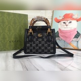 Оригинальная сумка-клатч из кожи с бамбуковыми ручками. Серия «Aria» от Gucci пр