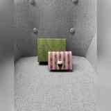 Новые кошельки Gucci с полосками в стиле трости пронизывают коллекцию «Gucci Lov
