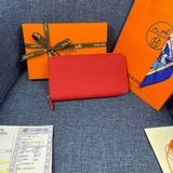 Оригинальный кожаный кошелек Hermès с текстурой личи, произведенный во Франции. 