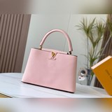 m48870 «Capucines Большая сумка» Эта модель выполнена из кожи Taurill, отличающе
