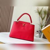 m48870 «Capucines Большая сумка» Эта модель выполнена из кожи Taurill, отличающе