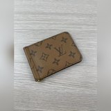 M66543 Кошелек для купюр с монограммой, металлическая застежка посередине, прост