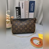 M41638 PALLS CLUTH Сумка Монограмма на парусине в сочетании с мягкой кожей с зер