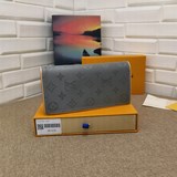 m63236 brazza кошелек. Этот кошелек Louis Vuitton brazza выполнен в стиле monogr