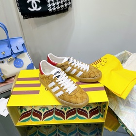 Совместная коллекция adidas x Gucci： кроссовки Gazelle для пар Ор