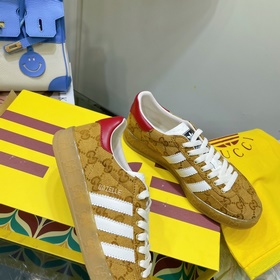 Совместная коллекция adidas x Gucci： кроссовки Gazelle для пар Ор