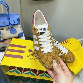 Совместная коллекция adidas x Gucci： кроссовки Gazelle для пар Ор