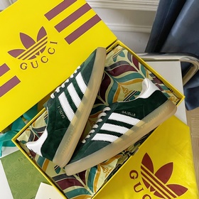 Совместная коллекция adidas x Gucci： кроссовки Gazelle для пар Ор