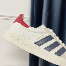 Совместная коллекция adidas x Gucci： кроссовки Gazelle для пар Ор