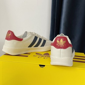 Совместная коллекция adidas x Gucci： кроссовки Gazelle для пар Ор