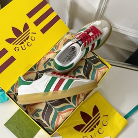 Совместная коллекция adidas x Gucci： кроссовки Gazelle для пар Ор