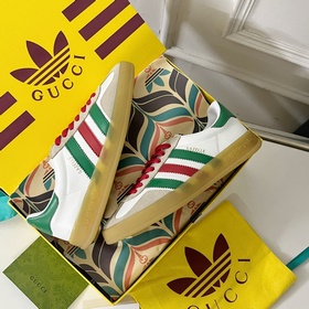 Совместная коллекция adidas x Gucci： кроссовки Gazelle для пар Ор