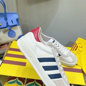 Совместная коллекция adidas x Gucci： кроссовки Gazelle для пар Ор