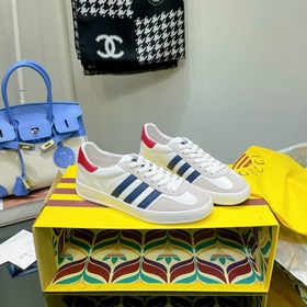 Совместная коллекция adidas x Gucci： кроссовки Gazelle для пар Ор