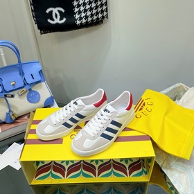 Совместная коллекция adidas x Gucci： кроссовки Gazelle для пар Ор