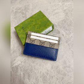 Новейшая модель Gucci — мужской кожаный кошелек с ажурными перепл