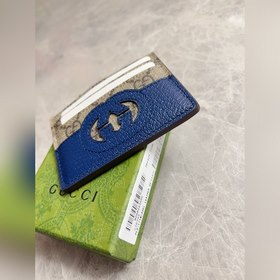 Новейшая модель Gucci — мужской кожаный кошелек с ажурными перепл
