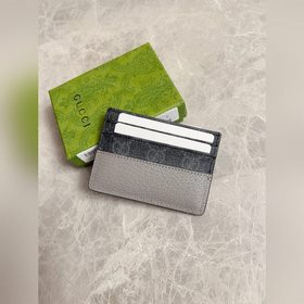 Новейшая модель Gucci — мужской кожаный кошелек с ажурными перепл
