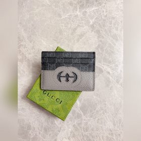 Новейшая модель Gucci — мужской кожаный кошелек с ажурными перепл