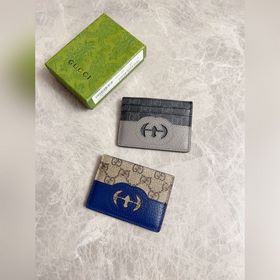 Новейшая модель Gucci — мужской кожаный кошелек с ажурными перепл