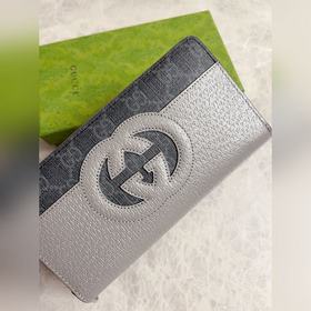 Новинка от Gucci — мужской кошелек на молнии с ажурными двойными 