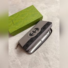 Новинка от Gucci — мужской кошелек на молнии с ажурными двойными 