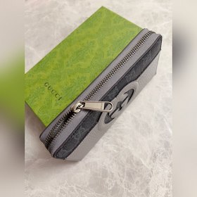 Новинка от Gucci — мужской кошелек на молнии с ажурными двойными 