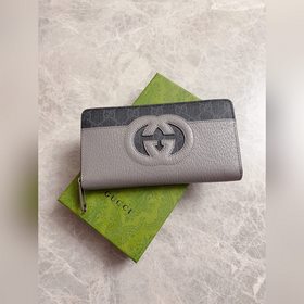 Новинка от Gucci — мужской кошелек на молнии с ажурными двойными 