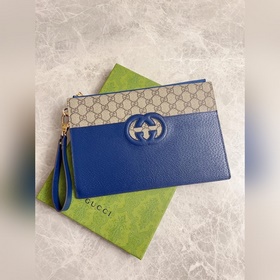Новейшая мужская сумка Gucci украшена ажурными переплетенными дво