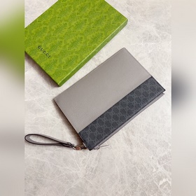 Новейшая мужская сумка Gucci украшена ажурными переплетенными дво