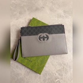 Новейшая мужская сумка Gucci украшена ажурными переплетенными дво