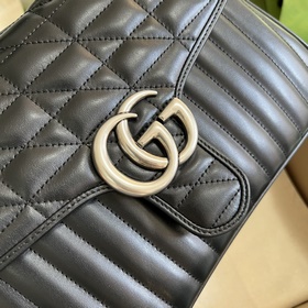 Сумка GG Marmont, входящая в коллекцию избранных сумок Gucci, изв