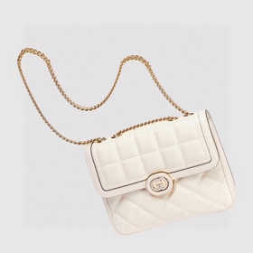 Маленькая сумка через плечо из серии Gucci Deco. Gucci продолжает