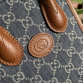Маленькая сумка из кожи денима от Gucci из серии «Aria — модная а