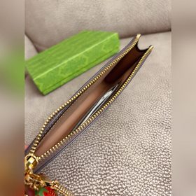 Новейшая модель Gucci — мини-кошелек для мелочи, рекомендованный 