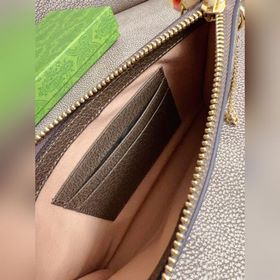 Новейшая модель Gucci — мини-кошелек для мелочи, рекомендованный 