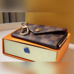 Классическая сумка Monogram из парусины с четкой кожаной окантовк