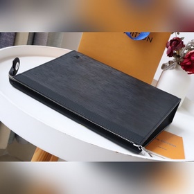 Волны Эта новая сумка среднего размера из прочной ткани Monogram