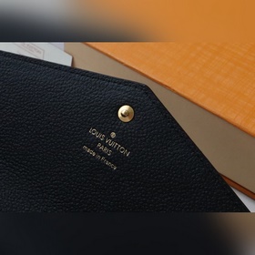 Этот кошелек на молниизготовлен из двухцветной кожи Monogram Empr