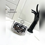 В комплекте с сумкой Fendi Nano Baguette из натурального рафии, подвеска в виде 
