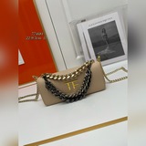 В комплекте с коробкой TF Tom Ford Palmetto Triple маленькая сумка на цепочке, и