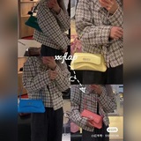 Новая сумка XX с откидной крышкой и подмышечным ремнем. Ее название происходит о