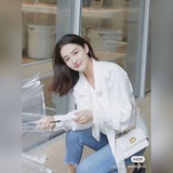 # KK0069#MISS CARO Мини-сумочка из черной кожи с крупным плетеным узором.